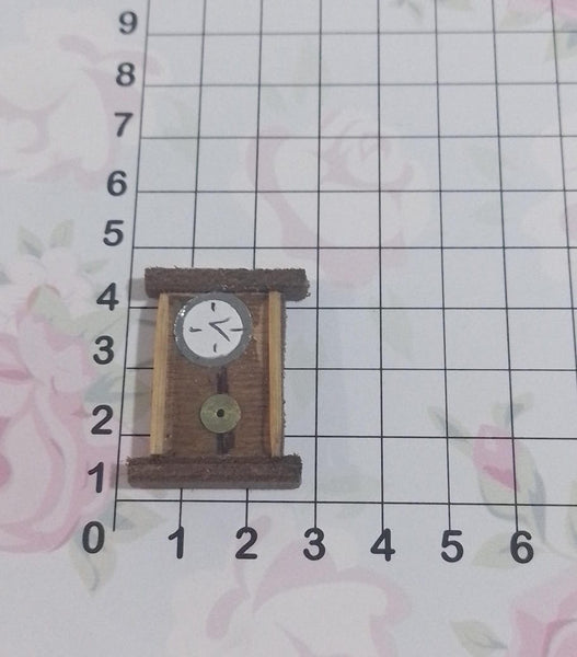 REF: 000025089 TIP. RELOJ MADERA MINI. ( AL. 3 X 2.5 AN. CMS)