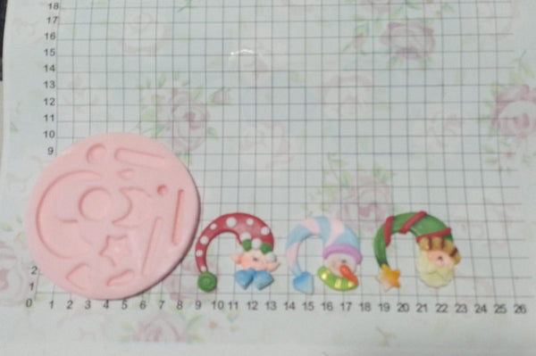 REF: 70000F181 MOLDE SILICONA CON FIGURA CARAS GORRO NAVIDAD