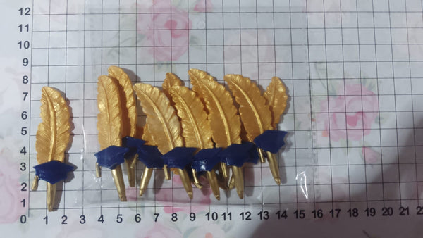 REF: PR0001118 PRENDEDOR PLUMAS GRADO *10 UND YC