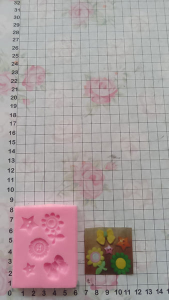 REF: 70000H127 MOLDE SILICONA FLORES MOÑO ESTRELLAS