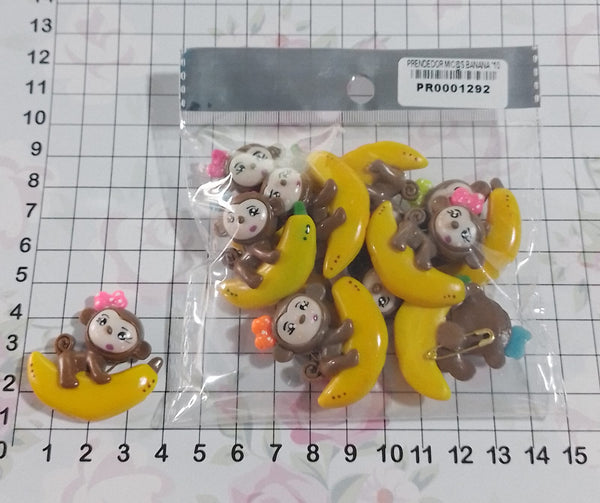 REF: PR0001292 PRENDEDOR MIC@S BANANA *10 UNDS.   *AVS*